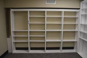 lot 162 image: White built-in wall bookshelf unit, includes extra shelves on the side - 119W x 12.5D x 78.5 Tall - bring tools and helpers to disassemble