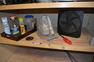 lot 177 image: Cleaning supplies, wooden serving tray, marble coaster, mesh basket, lighter and more