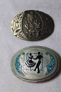 lot 92 image: (2) Belt buckles Dancing couple and Solid Brass Cowboy