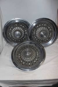 lot 16 image: Three Vintage Buick Spoke Hubcaps