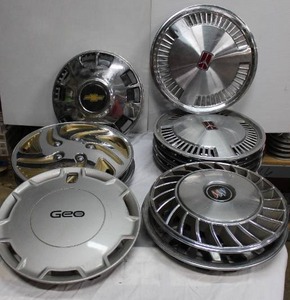 lot 121 image: Various Auto Hubcaps as shown in pictures