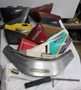lot 133 image: More Plastic Motorcycle Parts as shown