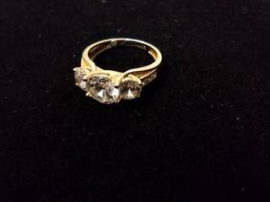 lot 112 image: Jewelry 14K PLUMB yellow gold and CZ ring. Marked P14K Size 8