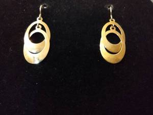 lot 114 image: Jewelry 18K yellow gold oval dangle earrings. Marked 18K CCI French ear wire design. Approx 1.25L