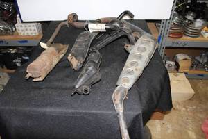 lot 351 image: Motorcycle and dirt bike Exhaust parts as shown