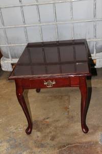 lot 365 image: Cherry colored End Table with front drawer