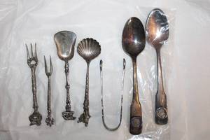 lot 213 image: Souvenir Spoons Sheepdog association, Sugarcube tongs and spoons, tiny shrimp forks, silverplate spoons, see pictures for markings