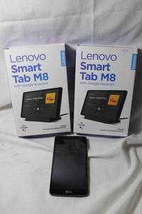 lot 219 image: (2) Lenovo Smart Tablets Model TB-8505FS and Gvista phone, working condition unknown, sold as is.