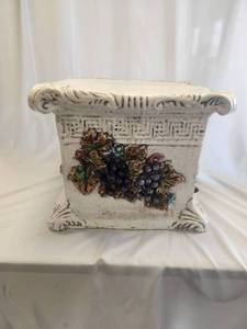 lot 24 image: Ornate pedestal embellished with raised fruits and flowers.