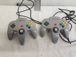 lot 125 image: Vintage Nintendo game controllers