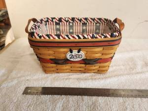 lot 123 image: Longaberger Collectible Basket - 2000 Century Celebration - liner and protector