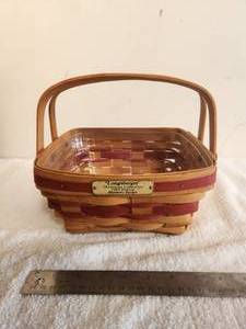 lot 145 image: Longaberger Collectible Basket - 1993 Christmas Collection Bayberry Basket - protector