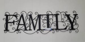 lot 52 image: METAL FAMILY DECORATIVE SIGN AS SHOWN. APPROX. 37 X 11
