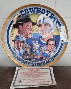 lot 56 image: LANDRY  STAUBACH COMMEMORATIVE 11 PLATE WITH COA AS SHOWN.