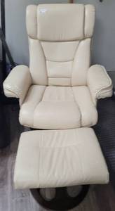 lot 58 image: LEATHER-STYLE CHAIR WITH OTTOMAN AS SHOWN.
