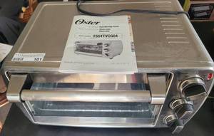 lot 101 image: OSTER COUNTERTOP OVEN AS SHOWN.