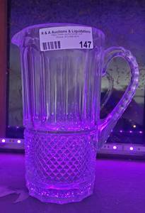 lot 147 image: 10 HIGH GLASS PITCHER IN STYLE SHOWN.