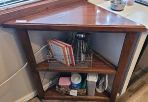 lot 153 image: CORNER WOOD TABLE AS SHOWN. CONTENTS NOT INCLUDED.