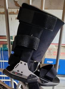lot 205 image: BLEDSOE BOOT BRACE AND CRUTCHES AS SHOWN.