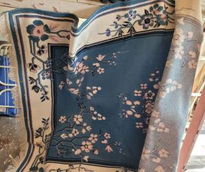lot 206 image: AREA RUG IN STYLEDESIGN SHOWN.