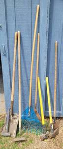 lot 214 image: LOT OF HAND TOOLS INCLUDING SLEDGEHAMMERS, RAKES AND MORE.