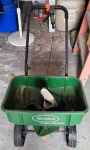 lot 218 image: SCOTTS SPREADER WITH RUBBER BOOTS AS SHOWN.