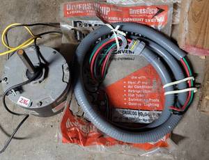 lot 286 image: FLEXIBLE CONDUIT AND MOTOR AS SHOWN.