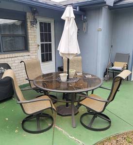 lot 234 image: PATIO TABLE, CHAIRS, AND UMBRELLA IN STYLE SHOWN. (SOLD 6 X THE MONEY)