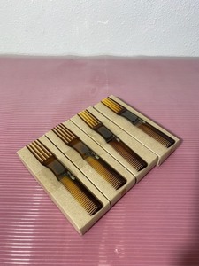 lot 35 image: Lot of 4 Boxes - New Mebco Hair Combo Pick & Comb, 48 Total - Brown