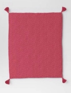 lot 68 image: New Threshold Textured Knit Throw Blanket With Tassels In Pink