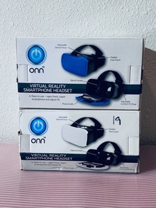lot 91 image: Lot of 2 - (1) New Onn Virtual Reality SmartPhone Headset Model# 0NA17VR001 - White & (1)  New Onn Virtual Reality SmartPhone Headset Model# 0NA17VR003 - Blue
