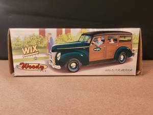 lot 104 image: Collector Series - 1940 Ford Woody - Wix filters Ertl die cast