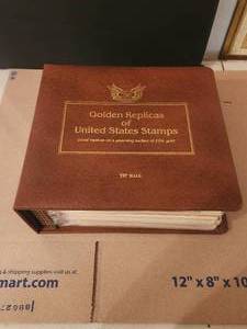 lot 5 image: Vintage Golden Replicas of United States Stamps - proof replicas gleaming surfaces of 22kt gold - First Day Issues