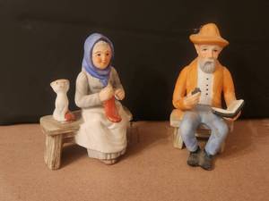 lot 44 image: Vintage pair of Elderly couple setting on benches - hand dated 782 and initialed by artist