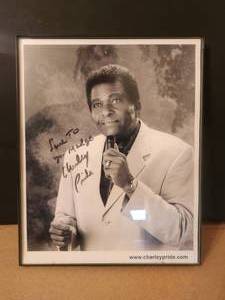 lot 65 image: Hand signedAutographed black and white 8x10 of Charley Pride