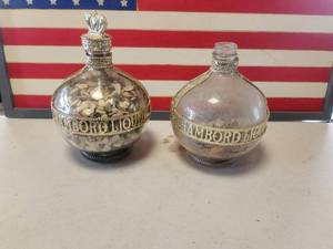 lot 132 image: Pair of Royale deluxe Chambord Liqueur bottles