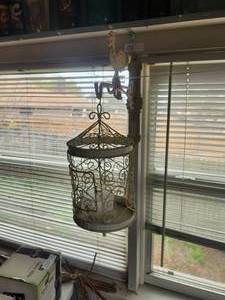 lot 155 image: Cast iron rooster hanger and bird cage - will need to be removed from wall