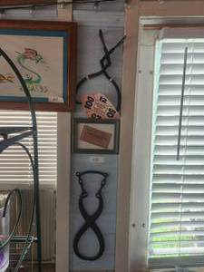 lot 172 image: Selection of vintage ice tongs and an Ice coupon book (framed)