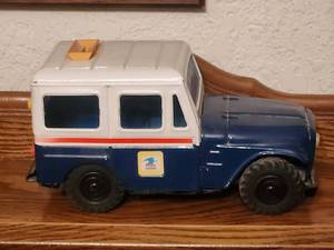 lot 217 image: Vintage pressed steel U.S. Mail Jeep bank