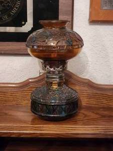 lot 220 image: Vintage Sail Boat Brand oil lamp