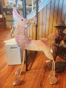 lot 229 image: Metal pink poodle