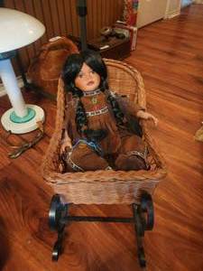 lot 232 image: Vintage Limited Collection - Madison Lee doll - Native American Child in sleigh - #26714950