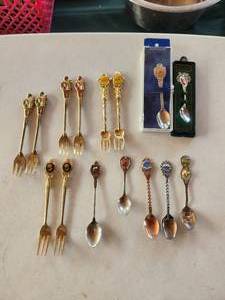 lot 91 image: Selection of collectible miniature spoons