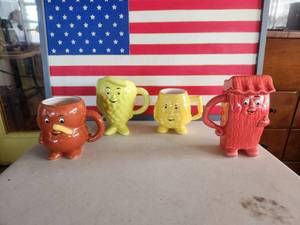 lot 187 image: Collectible health advertising mugs from Actos Pharmaceutical - retired