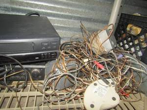 lot 43 image: mintek dvd player, zenith vhs tape player wit various speakers and misc. wires unknown working condition