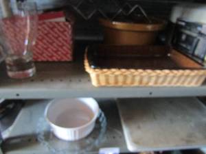lot 51 image: 2 large cutting boards, 2 clear glass glasses, baking dish with wicker insert, pie plate mixing bowl and more
