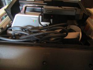 lot 53 image: trinicon 2400cam cord in case with flase like new