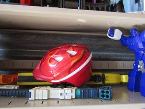lot 72 image: fire helmet, blue transformer, 2 play guns