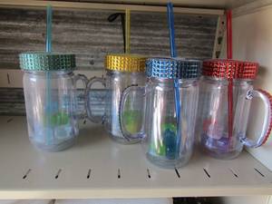 lot 75 image: 4 one handled plastic cups has jewel design