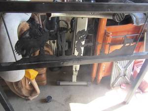 lot 86 image: black metal head board has western designs